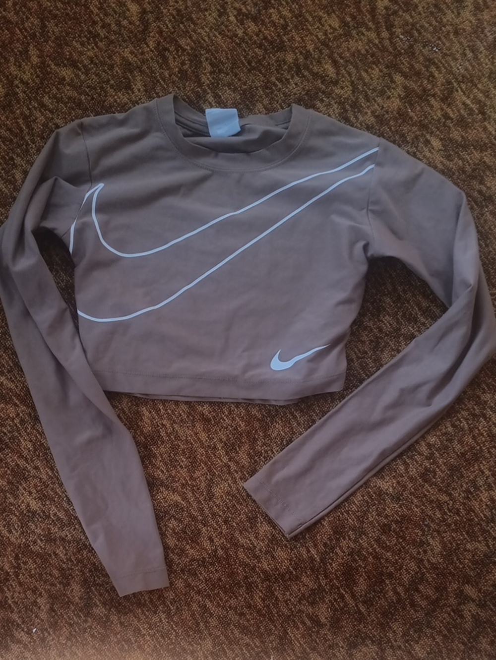 Now $5.  Nike Brown Cropped Long Sleeve Top with White Swoosh